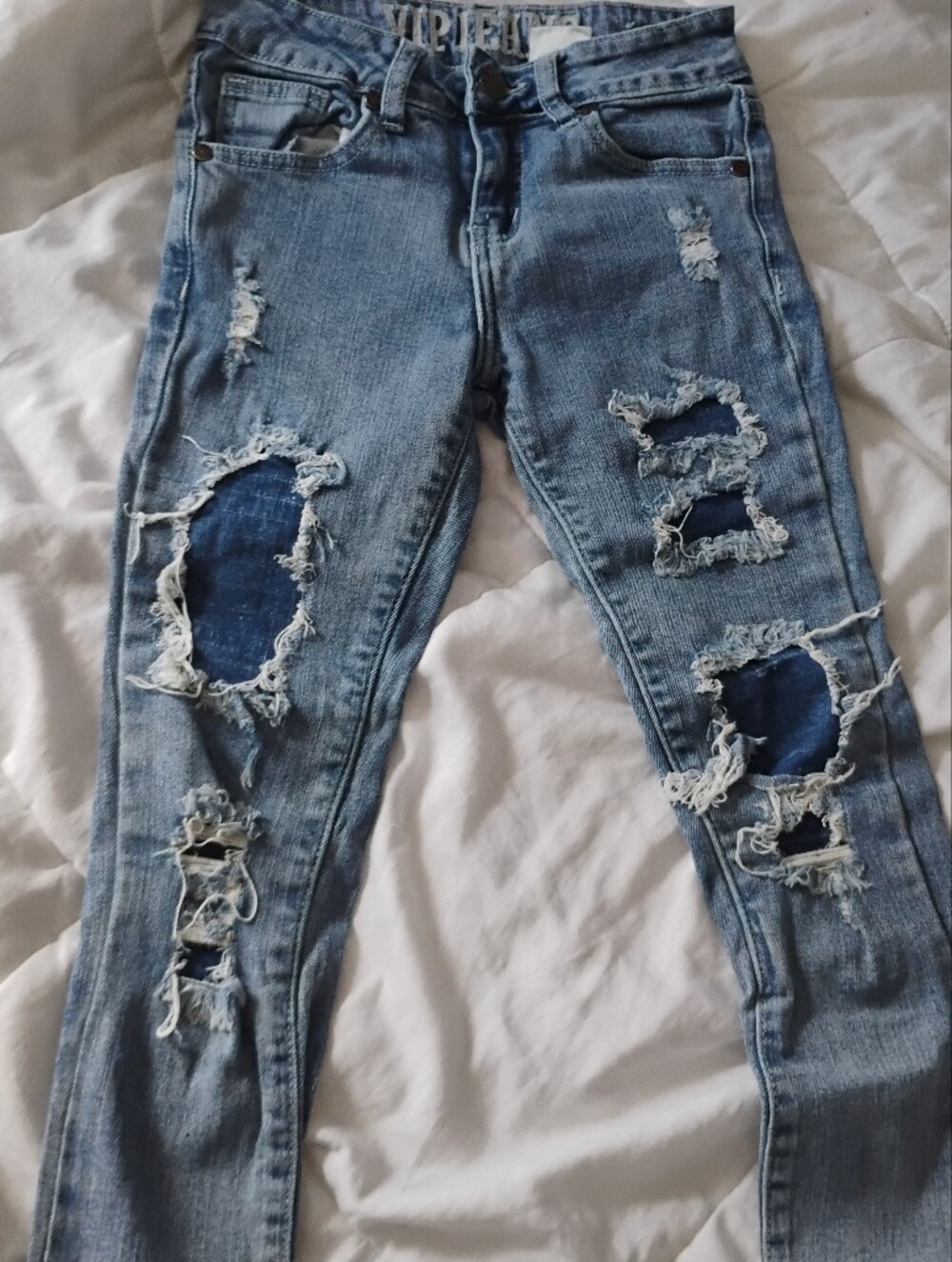 VIP Light Wash Distressed Jeans with Dark Blue Patch Details